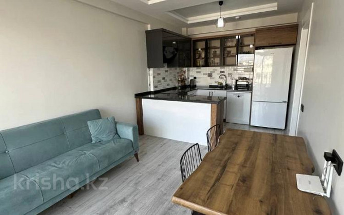 2-комнатная квартира, 50 м², 7/14 этаж, Tömük mah. 1 Мерсин - изображение 5
