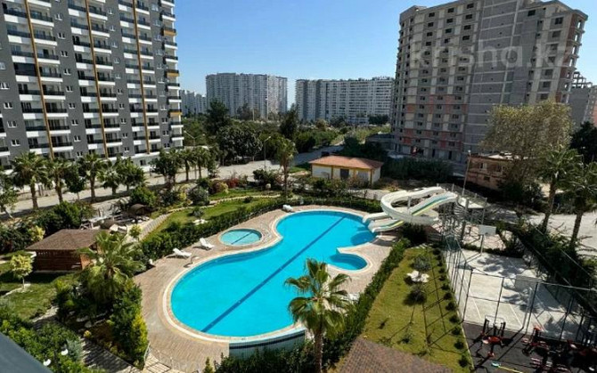 2-комнатная квартира, 50 м², 7/14 этаж, Tömük mah. 1 Мерсин - изображение 1