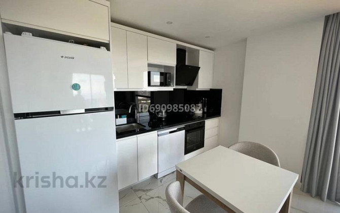 2-комнатная квартира, 55 м², 10/12 этаж, Махмутлар Аланья - изображение 5