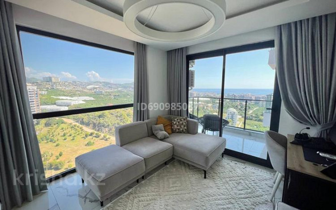2-комнатная квартира, 55 м², 10/12 этаж, Махмутлар Аланья - изображение 1