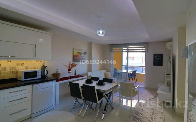 2-комнатная квартира, 55 м², 7/12 этаж, Махмутлар Аланья - изображение 1