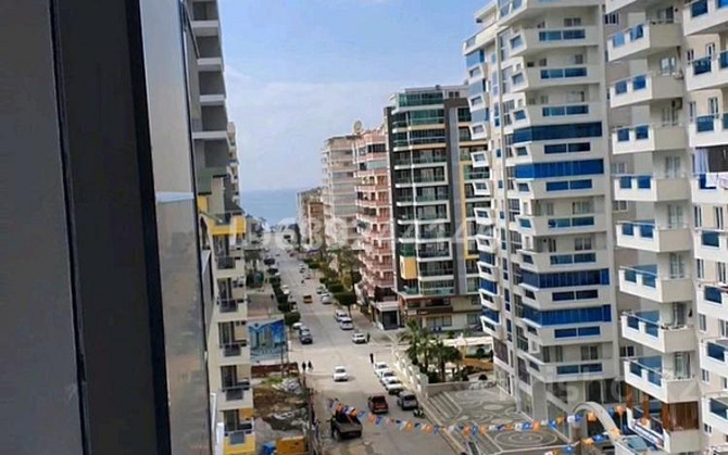 2-комнатная квартира, 55 м², 7/12 этаж, Махмутлар Аланья - изображение 2
