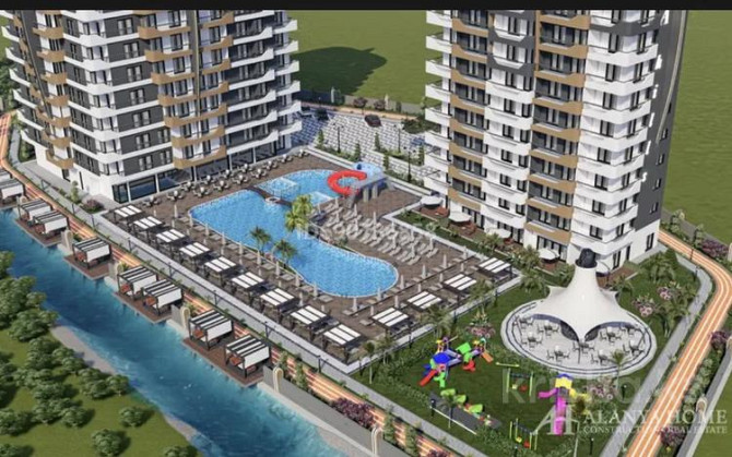 2-комнатная квартира, 50 м², 7/12 этаж, Mahmutlar 1 Аланья - изображение 1