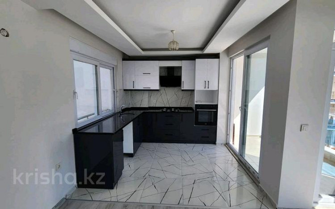 3-комнатная квартира, 75 м², 2/4 этаж, Муратпаша 77 Antalya - photo 2