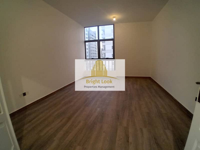 Modern & Cozy 2BR apart w/Maids Room & Balcony Tourist Club Area (TCA) - изображение 1
