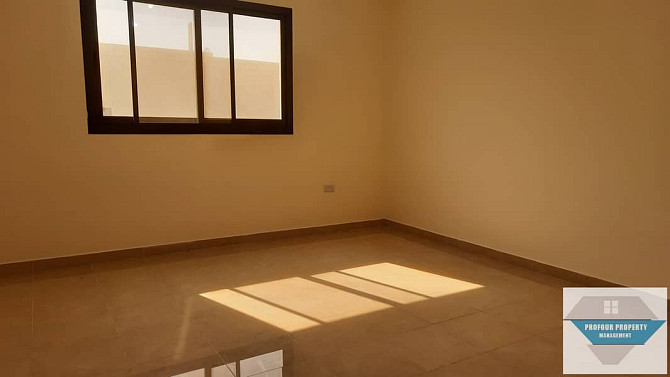 SPACIOUS -2 BEDROOMS BIG  HALL -COVERED PARKING  FOR RENT AT MBZ CITY Mohammed Bin Zayed City - photo 2
