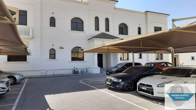 SPACIOUS -2 BEDROOMS BIG  HALL -COVERED PARKING  FOR RENT AT MBZ CITY Mohammed Bin Zayed City - photo 1