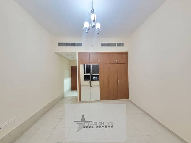 VERY SPACIOUS 2 BEDROOM APARTMENT  WITH MAID ROOM AT THE MAIN LOCATION READY TO MOVE. Al Warqaa - photo 2