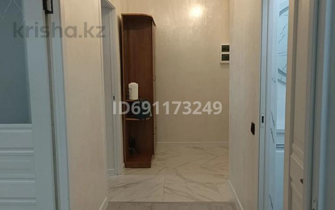 2-комнатная квартира, 55 м², 8/12 этаж помесячно, Кошкарбаева  - photo 8
