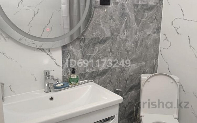 2-комнатная квартира, 55 м², 8/12 этаж помесячно, Кошкарбаева  - photo 2