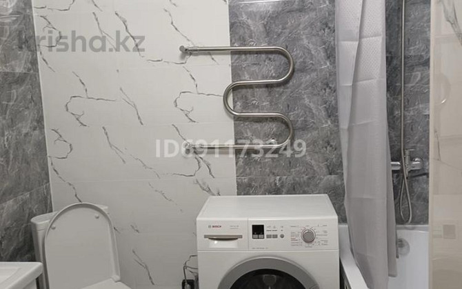 2-комнатная квартира, 55 м², 8/12 этаж помесячно, Кошкарбаева  - photo 1