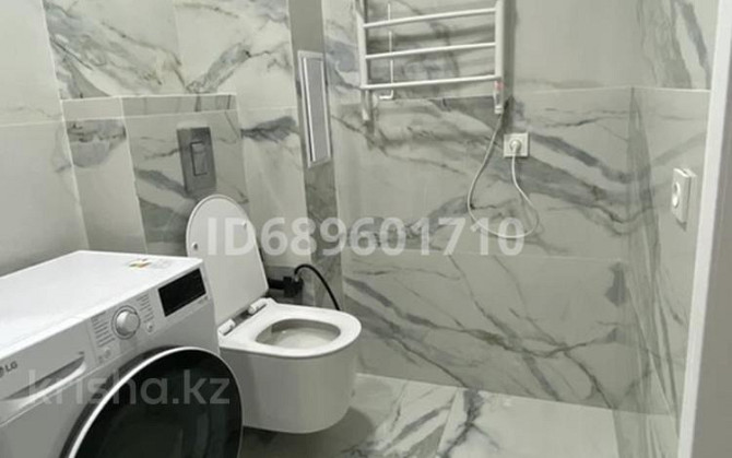 2-комнатная квартира, 70 м², 2/9 этаж помесячно, мкр Атырау, Абулхайыр хана 51а - ЦОН, BINOM, центр  Атырау - изображение 8