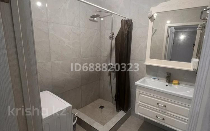 2-комнатная квартира, 70 м², 7/9 этаж помесячно, мкр Думан-2 286 - Магнум Алматы - изображение 5