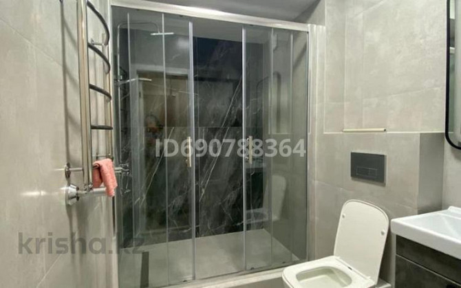 2-комнатная квартира, 57 м², 7/9 этаж помесячно, мкр Сайран, Варламова 345 - Толе би Алматы - изображение 6