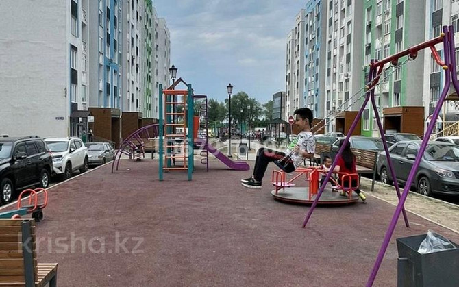 2-комнатная квартира, 55 м², 9/9 этаж помесячно, ул. Раимбека батыра 288  - photo 2