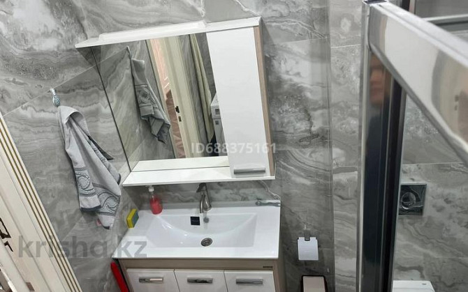 2-комнатная квартира, 70 м², 3/10 этаж помесячно, Абая 26а Атырау - изображение 8