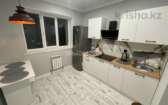 2-комнатная квартира, 55 м², 9/12 этаж помесячно, Кошкарбаева 1144  - photo 4