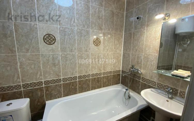 1-комнатная квартира, 40 м², 7/9 этаж помесячно, 5 микрорайон - проспект Мира- Металлургов Temirtau - photo 8
