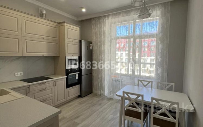 2-комнатная квартира, 68.4 м², 8/10 этаж помесячно, Туран 46/6 Астана - изображение 4