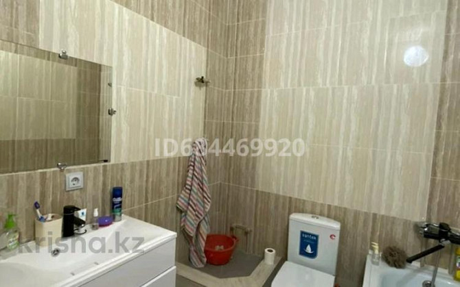 2-комнатная квартира, 70 м², 4/9 этаж помесячно, Нажединова 27 Астана - изображение 4