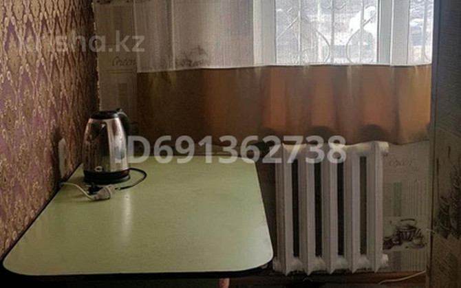 3-комнатная квартира, 55 м², 1 этаж помесячно, 2 мкр 25  - photo 4