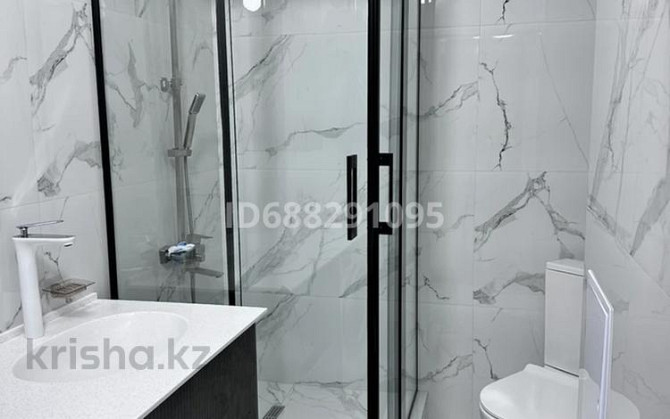 2-комнатная квартира, 68.8 м², 6/9 этаж помесячно, мкр Нурсая, Абылхаир хана 226/1 - Жумагалиева Atyrau - photo 7