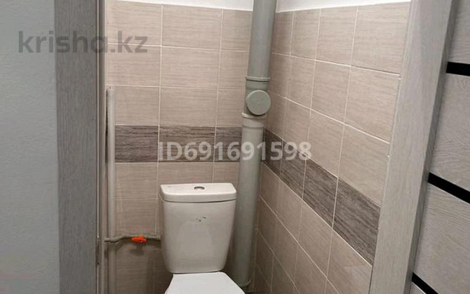 1-комнатная квартира, 40 м², 1/5 этаж помесячно, 15 мкр 1193/5 - Заезд со стороны Сулеманова Taraz - photo 2