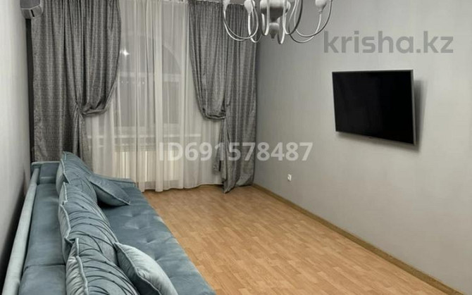 2-комнатная квартира, 67 м², 10/10 этаж помесячно, мкр Болашак, Бокенбай батыра 129к/к1 Актобе - изображение 2