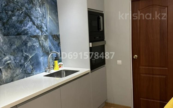 2-комнатная квартира, 67 м², 10/10 этаж помесячно, мкр Болашак, Бокенбай батыра 129к/к1 Актобе - изображение 7