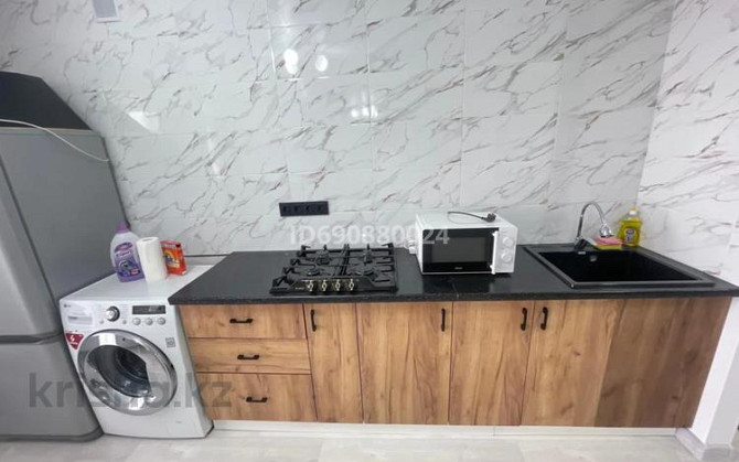2-комнатная квартира, 80 м², 9/10 этаж помесячно, мкр. Алтын орда, Санкибай батыра 40в - Сзади гипер Актобе - изображение 8