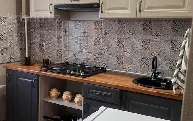 1-комнатная квартира, 33 м², 5/5 этаж помесячно, Молдагулова 26 - Торговая база,Казииту,Анвар Суперм Oral - photo 2