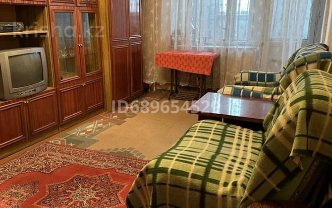 2-комнатная квартира, 52 м², 1 этаж помесячно, Целинная 68 Ekibastuz - photo 1