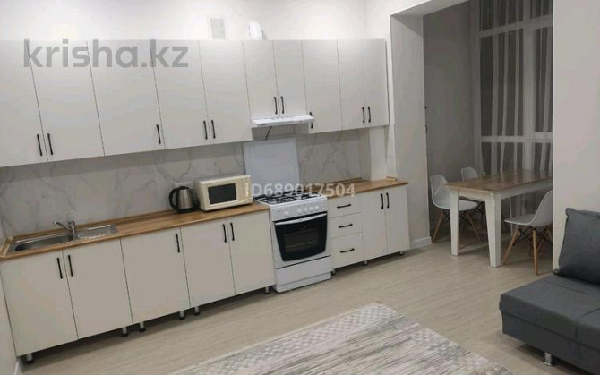 2-комнатная квартира, 55 м², 4/7 этаж помесячно, 19-й мкр, 19 мкрн 29/1 - Гипермаркет Дина Актау - изображение 1