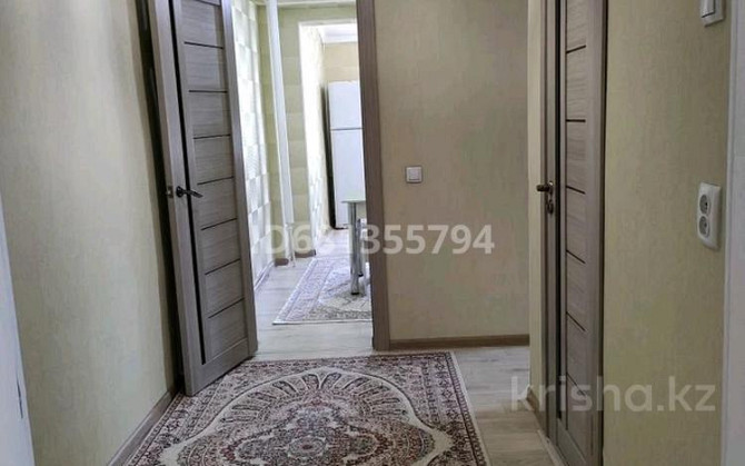2-комнатная квартира, 60 м², 2/12 этаж посуточно, Тауке хана 33 — Дулати Shymkent - photo 3