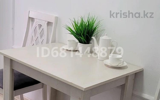 2-комнатная квартира, 50 м², 1/5 этаж посуточно, мкр 8, Алии Молдагуловой 41 корпус 1 — Абулхаирхана Актобе - изображение 5