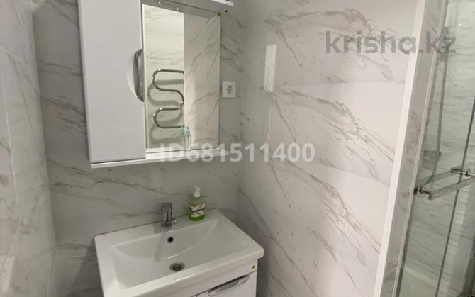1-комнатная квартира, 55 м², 2/9 этаж посуточно, мкр Нурсая, Абулхаир хана 63 — По дороге в аэропорт Atyrau - photo 7