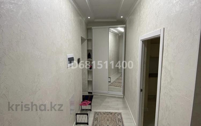 1-комнатная квартира, 55 м², 2/9 этаж посуточно, мкр Нурсая, Абулхаир хана 63 — По дороге в аэропорт Atyrau - photo 5