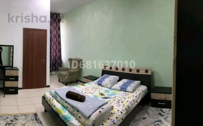 1-комнатная квартира, 600 м², 2/2 этаж посуточно, Кабанбай батыра 28б — Толе би Shymkent - photo 7