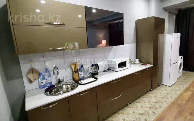 1-комнатная квартира, 50 м², 10/12 этаж посуточно, 16-й мкр , 16 мкрн 55/11-55/16 Aqtau - photo 2
