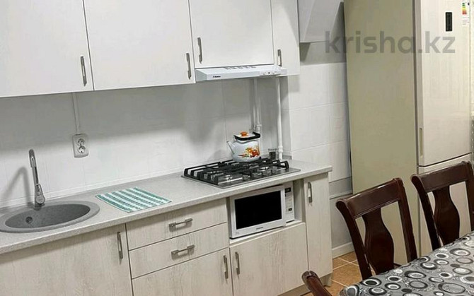 3-комнатная квартира, 80 м², 1/9 этаж посуточно, мкр Аксай-5, Момышулы 13 Алматы - изображение 8