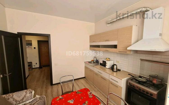 1-комнатная квартира, 50 м², 9/9 этаж посуточно, Алии Молдагуловой 30б — Ал/молдагулова Актобе - изображение 6