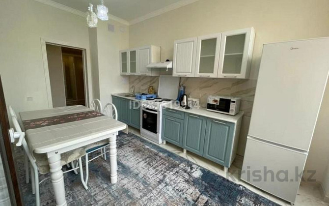 2-комнатная квартира, 78 м², 4/12 этаж посуточно, Сзади Обл. Акимата — Жаңа қала 32 көше Туркестан - изображение 4
