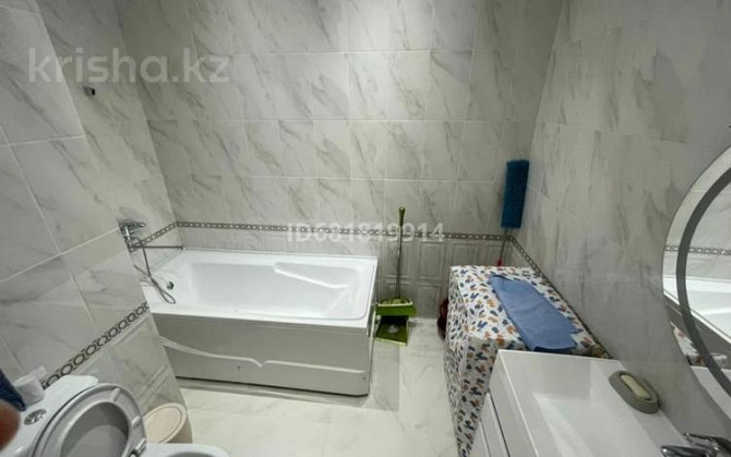 2-комнатная квартира, 78 м², 4/12 этаж посуточно, Сзади Обл. Акимата — Жаңа қала 32 көше Туркестан - изображение 3
