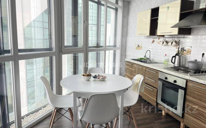 2-комнатная квартира, 60 м², 19/22 этаж посуточно, Чингиз Айтматов Astana - photo 1