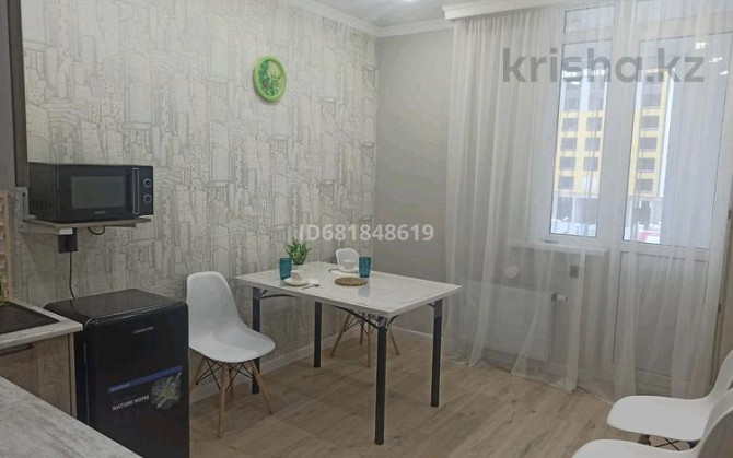 1-комнатная квартира, 40 м², 3/9 этаж посуточно, Нурмаганбетова 27 — Байтурсынова Astana - photo 7