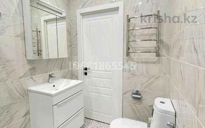 1-комнатная квартира, 44 м², 6/9 этаж посуточно, Керей Жанибек Хандар 12/1 Астана - изображение 2