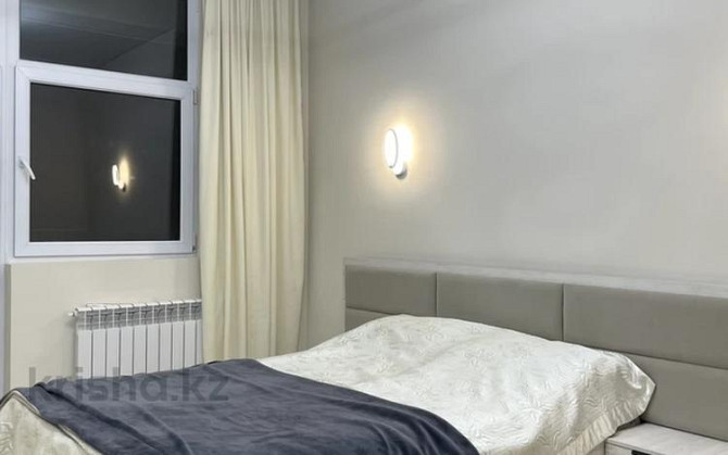 2-комнатная квартира, 63 м², 11/18 этаж посуточно, Розыбакиева 20 — Утепова Almaty - photo 2