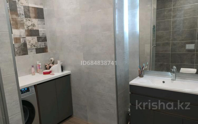 2-комнатная квартира, 57 м², 9/9 этаж помесячно, Самал 82/1 - Коняхина Oral - photo 5