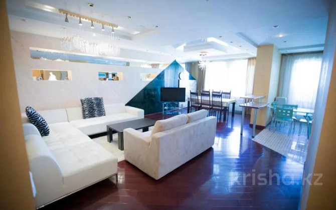4-комнатная квартира, 200 м², 21/33 этаж посуточно, Кабанбай батыра 11 — Сарайшык Astana - photo 1