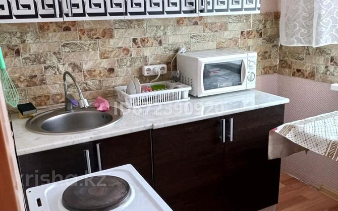 1-комнатная квартира, 32 м², 4/5 этаж помесячно, Момышулы 1 Zhezqazghan - photo 1